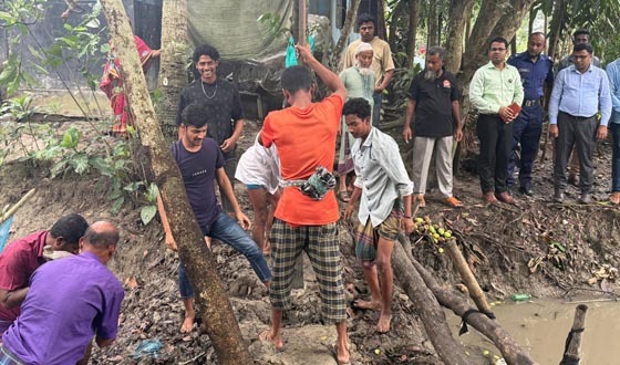 অবৈধভাবে নির্মিত বাঁধ অপসারণ