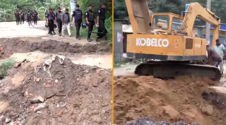 গভীর রাতে বুলডোজার দিয়ে র‌্যাব ক্যাম্পের দেয়াল গুঁড়িয়ে দিল সন্ত্রাসীরা, খুঁড়ল রাস্তাও