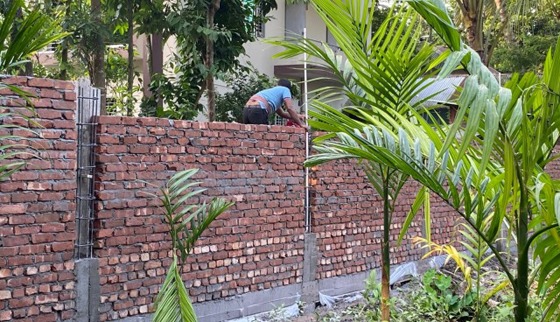 বানারীপাড়ার সাবেক মেয়রের জমিতে সীমানা প্রচীর নির্মাণ