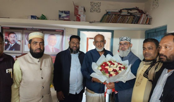 বিএনপির পরাজিত প্রার্থীর বাড়িতে ফুল নিয়ে জামায়াতের বিজয়ী মাসুদ সাঈদী
